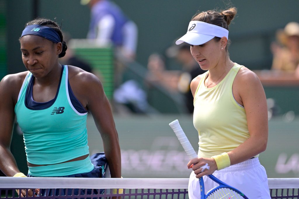 Mar 12, 2025; Indian Wells, CA, USA; Coco Gauff (USA) and Belinda Bencic (SUI) leave the court following the fourth round of the BNP Paribas Open at the Indian Well Tennis Garden. Mandatory Credit: Jayne Kamin-Oncea-Imagn Images