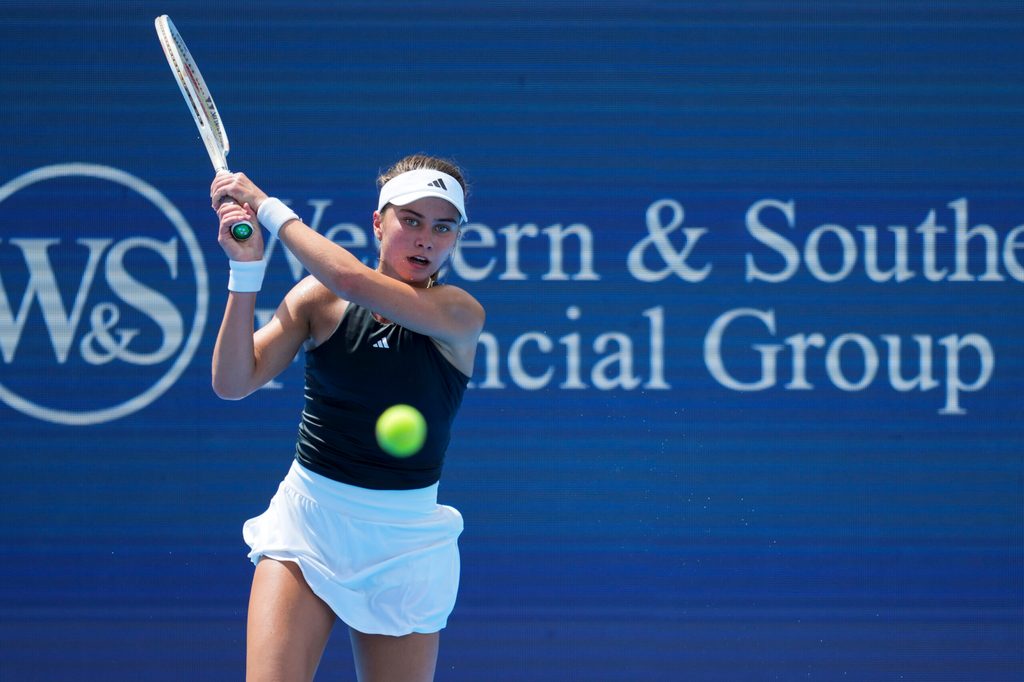 Aug 12, 2025; Cincinnati, OH, USA; Iva Jovic (USA) returns a shot against Barbora Krejcikova (CZE) during the Cincinnati Open at the Lindner Family Tennis Center. Mandatory Credit: Aaron Doster-Imagn Images