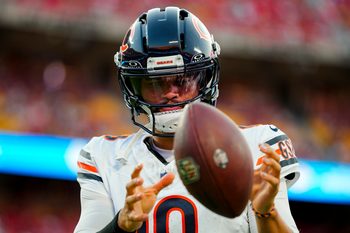 Aug 22, 2025; Kansas City, Missouri, USA; Chicago Bears quarterback Caleb Williams (18) warms up during the first half against the Kansas City Chiefs at GEHA Field at Arrowhead Stadium. Mandatory Credit: Jay Biggerstaff-Imagn Images
