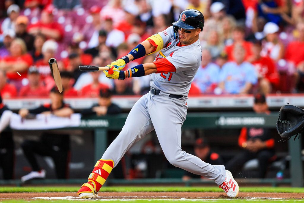 Aug 29, 2025; Cincinnati, Ohio, USA; St. Louis Cardinals outfielder Lars Nootbaar (21) breaks his bat on a pitch in the first inning against the Cincinnati Reds at Great American Ball Park. Mandatory Credit: Katie Stratman-Imagn Images