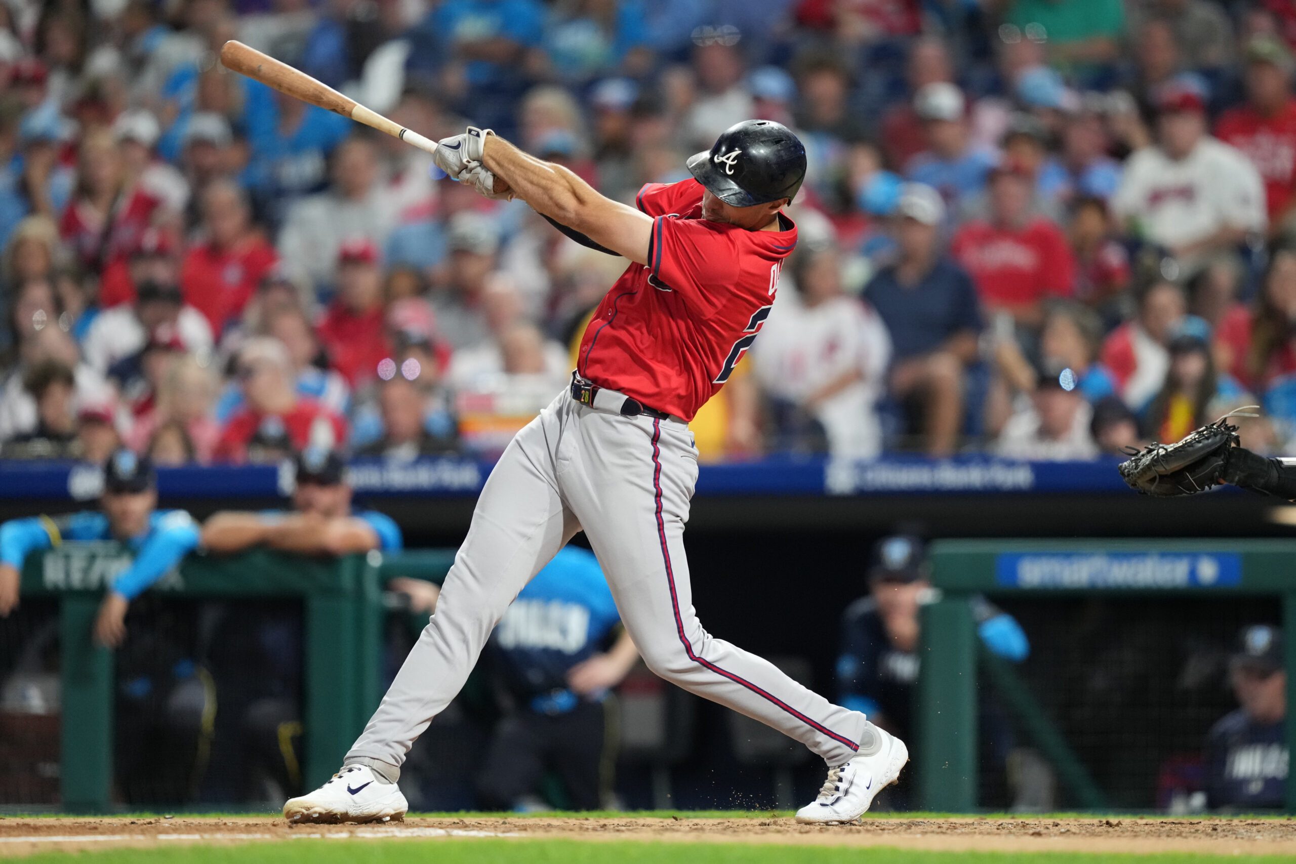 Aug 29, 2025; Philadelphia, Pennsylvania, USA; Atlanta Braves infielder Matt Olson (28) hits a single against the Philadelphia Phillies in the fifth inning at Citizens Bank Park. Mandatory Credit: Kyle Ross-Imagn Images