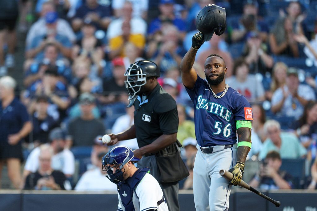 Sep 1, 2025; Tampa, Florida, USA; Seattle Mariners left fielder Randy Arozarena (56) reacts to fans during his first at bat against the Tampa Bay Rays in the first inning at George M. Steinbrenner Field. Mandatory Credit: Nathan Ray Seebeck-Imagn Images