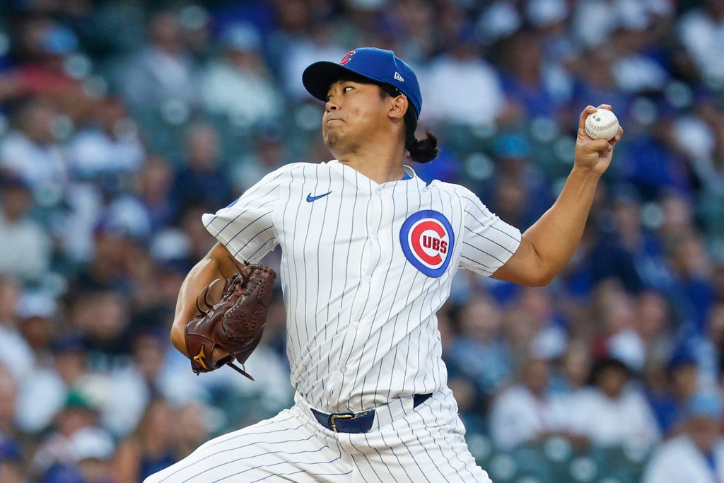 Sep 5, 2025; Chicago, Illinois, USA; Chicago Cubs starting pitcher Shota Imanaga (18) delivers a pitch against the Atlanta Braves during the first inning at Wrigley Field. Mandatory Credit: Kamil Krzaczynski-Imagn Images