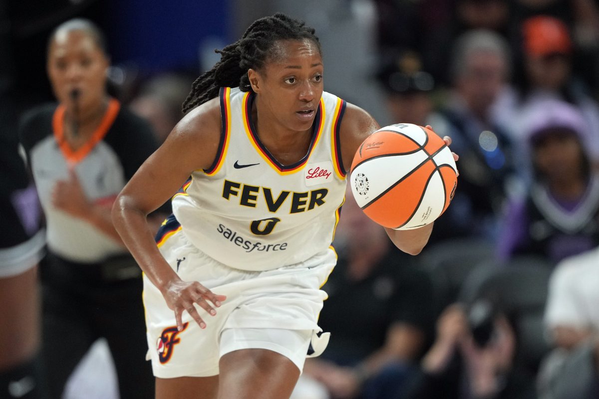 Aug 31, 2025; San Francisco, California, USA; Indiana Fever guard Kelsey Mitchell (0) dribbles against the Golden State Valkyries during the third quarter at Chase Center. Mandatory Credit: Darren Yamashita-Imagn Images