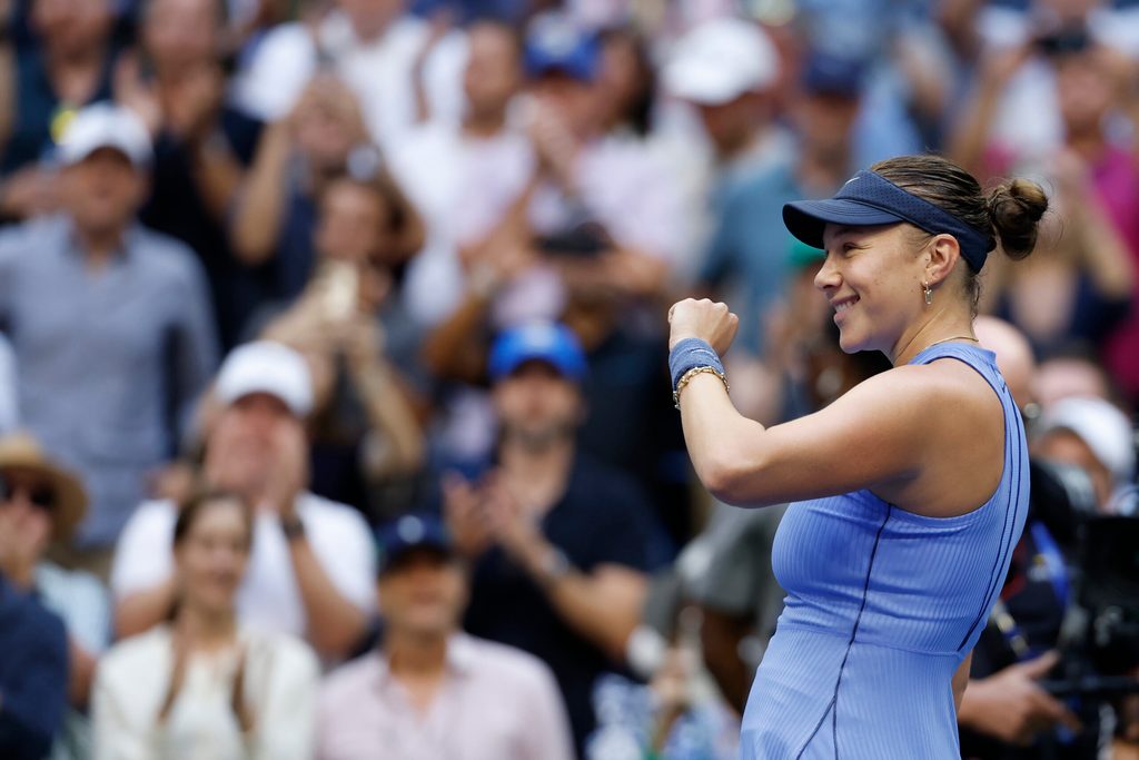 Sep 3, 2025; Flushing, NY, USA; Amanda Anisimova (USA) celebrates towards her player's box after her match against Iga Swiatek (POL) (not pictured) on day eleven of the 2025 US Open tennis championships at USTA Billie Jean King National Tennis Center. Mandatory Credit: Geoff Burke-Imagn Images