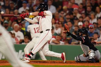 Sep 3, 2025; Boston, Massachusetts, USA; Boston Red Sox second base Nick Sogard (20) gets a hit to drive in a run against the Cleveland Guardians in the fourth inning at Fenway Park. Mandatory Credit: David Butler II-Imagn Images
