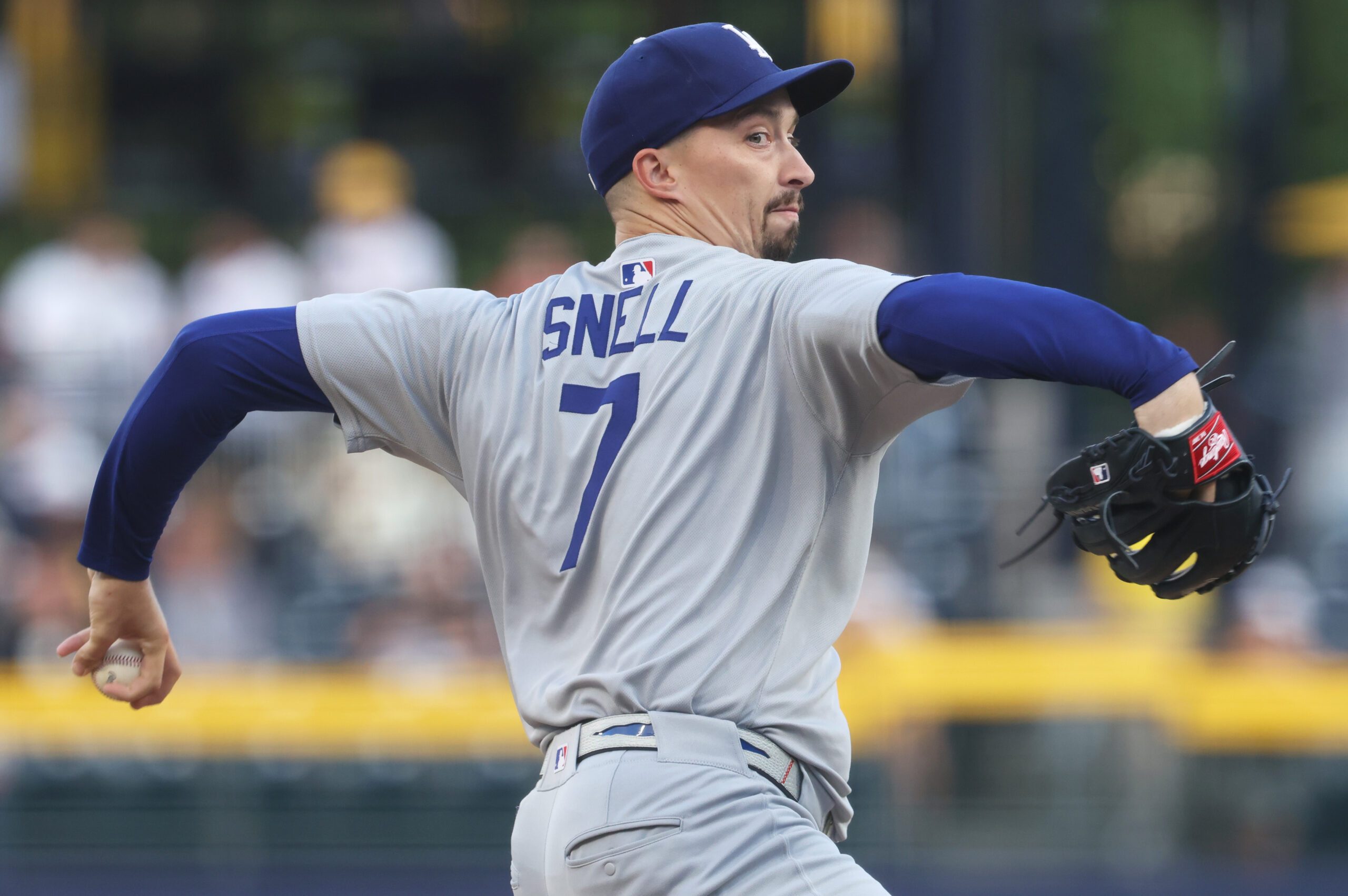Sep 4, 2025; Pittsburgh, Pennsylvania, USA;  Los Angeles Dodgers starting pitcher Blake Snell (7) delivers a pitch against the Pittsburgh Pirates during the first inning at PNC Park. Mandatory Credit: Charles LeClaire-Imagn Images