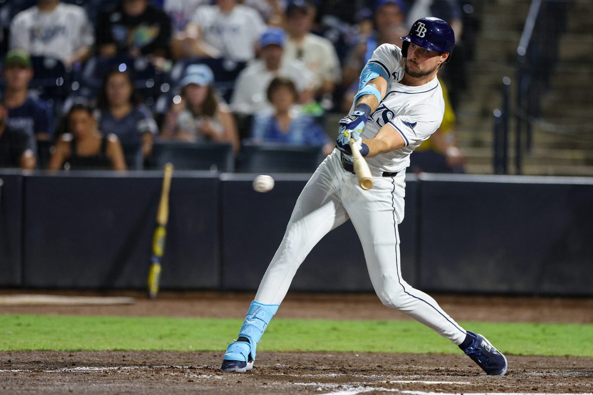 Sep 4, 2025; Tampa, Florida, USA; Tampa Bay Rays outfielder Josh Lowe (15) hits into a fielders choice rbi against the Cleveland Guardians in the sixth inning at George M. Steinbrenner Field. Mandatory Credit: Nathan Ray Seebeck-Imagn Images