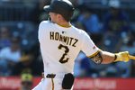 Sep 7, 2025; Pittsburgh, Pennsylvania, USA;  Pittsburgh Pirates first baseman Spencer Horwitz (2) hits a single against the Milwaukee Brewers during the eighth inning at PNC Park. Mandatory Credit: Charles LeClaire-Imagn Images