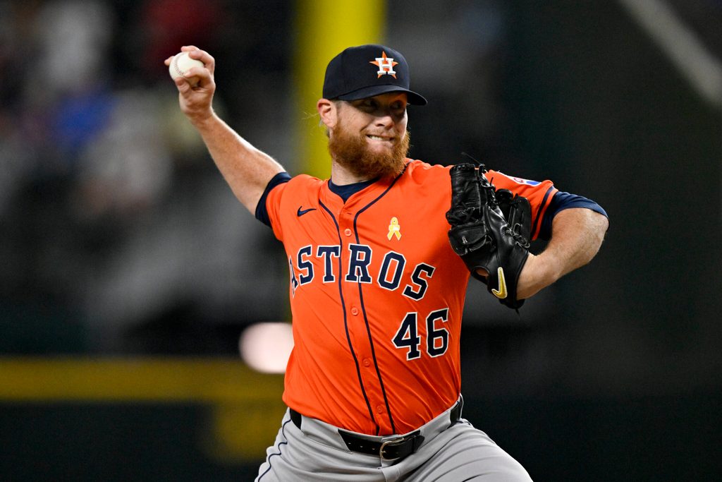 Sep 7, 2025; Arlington, Texas, USA; Houston Astros relief pitcher Craig Kimbrel (46) pitches against the Texas Rangers during the eighth inning at Globe Life Field. Mandatory Credit: Jerome Miron-Imagn Images