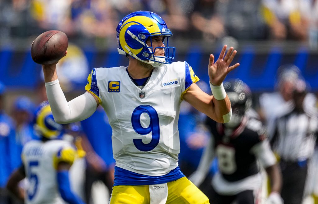 Sep 7, 2025; Inglewood, California, USA; Los Angeles Rams quarterback Matthew Stafford (9) attempts a pass during the first quarter at SoFi Stadium. Mandatory Credit: Kirby Lee-Imagn Images