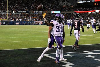 Sep 8, 2025; Chicago, Illinois, USA; Minnesota Vikings running back Aaron Jones Sr. (33) reacts after a touchdown against the Chicago Bears during the second half at Soldier Field. Mandatory Credit: Matt Marton-Imagn Images