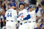 Sep 8, 2025; Los Angeles, California, USA; Los Angeles Dodgers designated hitter Shohei Ohtani (17) scores in the seventh inning against the Colorado Rockies as Dodgers center fielder Andy Pages (44) and first baseman Freddie Freeman (5) watch at Dodger Stadium. Mandatory Credit: Kirby Lee-Imagn Images
