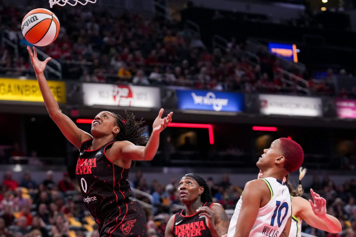 Indiana Fever guard Kelsey Mitchell (0) goes up for a basket Tuesday, Sept. 9, 2025, during a game between the Indiana Fever and the Minnesota Lynx at Gainbridge Fieldhouse in Indianapolis.