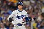 Sep 10, 2025; Los Angeles, California, USA; Los Angeles Dodgers designated hitter Shohei Ohtani (17) looks on during the first inning against the Colorado Rockies at Dodger Stadium. Mandatory Credit: Jayne Kamin-Oncea-Imagn Images