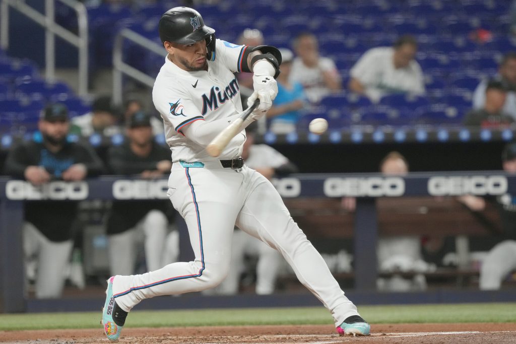 Sep 11, 2025; Miami, Florida, USA; Miami Marlins designated hitter Agustin Ramirez (50) singles to left field in the first inning against the Washington Nationals at loanDepot Park. Mandatory Credit: Jim Rassol-Imagn Images