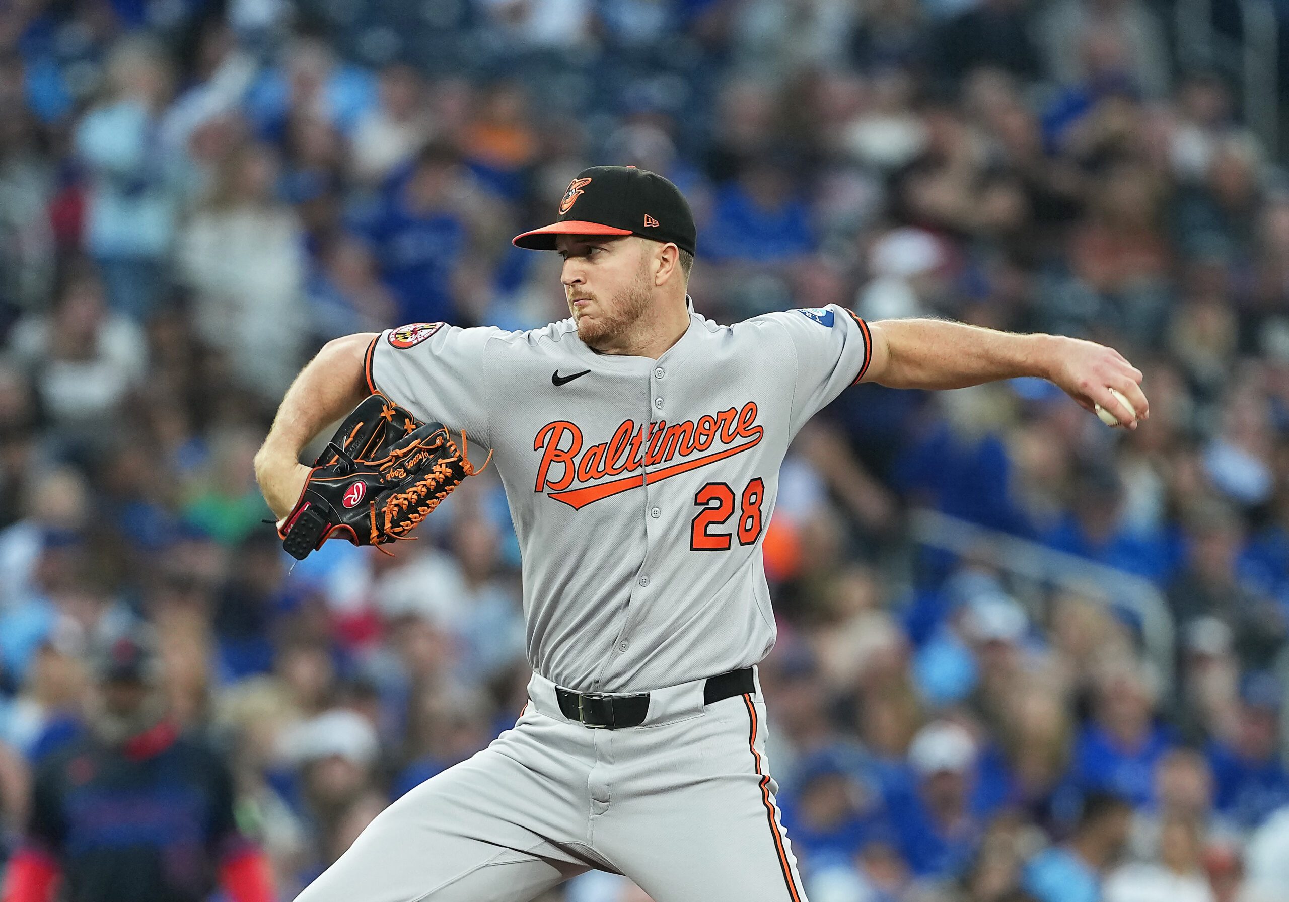 Sep 12, 2025; Toronto, Ontario, CAN; Baltimore Orioles starting pitcher Trevor Rogers (28) throws a pitch against the Toronto Blue Jays during the first inning at Rogers Centre. Mandatory Credit: Nick Turchiaro-Imagn Images
