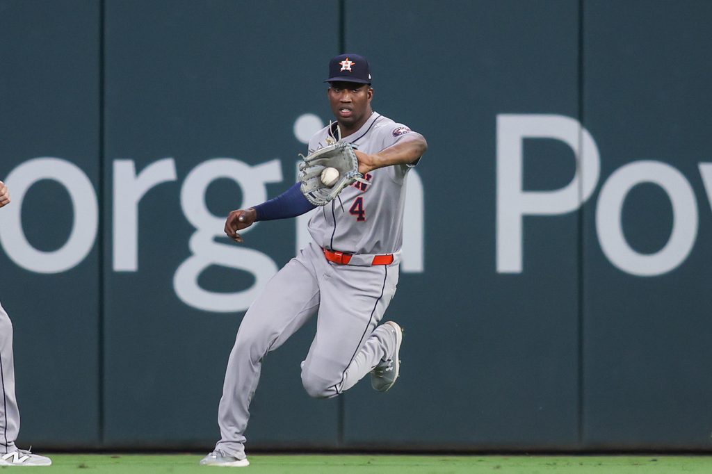 Sep 12, 2025; Atlanta, Georgia, USA; Houston Astros right fielder Jesus Sanchez (4) fields a ball against the Atlanta Braves in the eighth inning at Truist Park. Mandatory Credit: Brett Davis-Imagn Images
