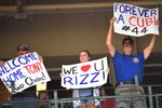 Sep 13, 2025; Chicago, Illinois, USA; Fans hold up signs for former Chicago Cubs player Anthony Rizzo during a game against the Tampa Bay Rays at Wrigley Field. Mandatory Credit: Patrick Gorski-Imagn Images