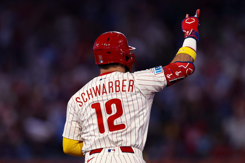 Sep 13, 2025; Philadelphia, Pennsylvania, USA; Philadelphia Phillies outfielder Kyle Schwarber (12) reacts to his home run against the Kansas City Royals during the fifth inning at Citizens Bank Park. Mandatory Credit: Bill Streicher-Imagn Images