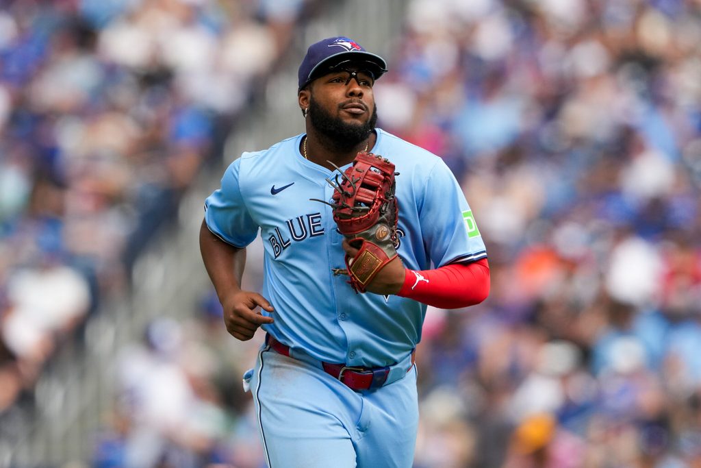 Sep 14, 2025; Toronto, Ontario, CAN; Toronto Blue Jays first base Vladimir Guerrero Jr. (27) runs back to the dugout after the second inning against the Baltimore Orioles at Rogers Centre. Mandatory Credit: Kevin Sousa-Imagn Images
