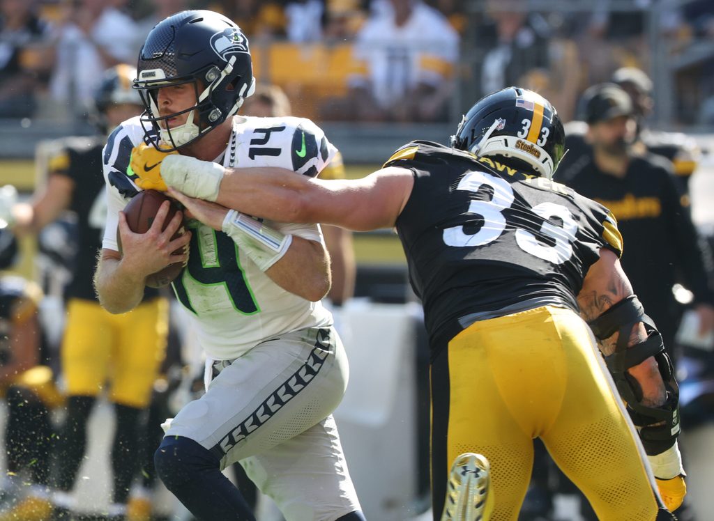 Sep 14, 2025; Pittsburgh, Pennsylvania, USA; Pittsburgh Steelers linebacker Jack Sawyer (33) sacks Seattle Seahawks quarterback Sam Darnold (14) during the fourth quarter at Acrisure Stadium. Mandatory Credit: Charles LeClaire-Imagn Images
