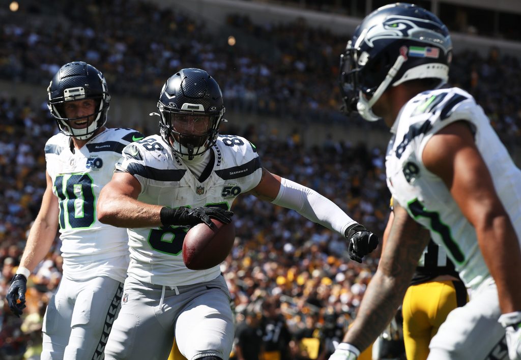Sep 14, 2025; Pittsburgh, Pennsylvania, USA; Seattle Seahawks tight end AJ Barner (88) reacts with wide receivers Cooper Kupp (10) and Jaxon Smith-Njigba (right) after catching a touchdown pass against the Pittsburgh Steelers during the third quarter at Acrisure Stadium. Mandatory Credit: Charles LeClaire-Imagn Images