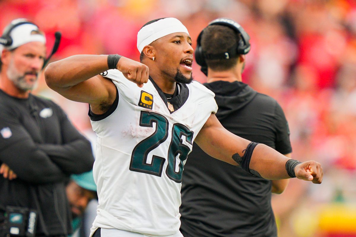 Sep 14, 2025; Kansas City, Missouri, USA; Philadelphia Eagles running back Saquon Barkley (26) reacts during the second half against the Kansas City Chiefs at GEHA Field at Arrowhead Stadium. Mandatory Credit: Jay Biggerstaff-Imagn Images