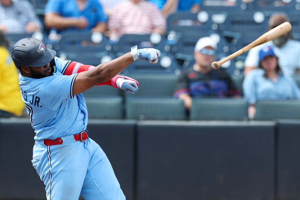 Sep 18, 2025; Tampa, Florida, USA; Toronto Blue Jays first baseman Vladimir Guerrero Jr. (27) looses his bat on a swing against the Tampa Bay Rays in the seventh inning at George M. Steinbrenner Field. Mandatory Credit: Nathan Ray Seebeck-Imagn Images