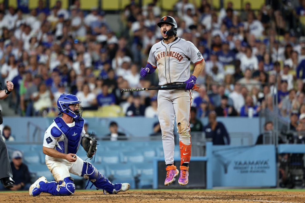 Sep 18, 2025; Los Angeles, California, USA; San Francisco Giants shortstop Willy Adames (2) reacts after strike out looking during the seventh inning against the Los Angeles Dodgers at Dodger Stadium. Mandatory Credit: Kiyoshi Mio-Imagn Images