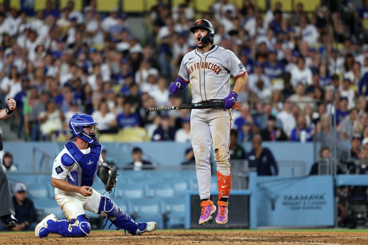 Sep 18, 2025; Los Angeles, California, USA; San Francisco Giants shortstop Willy Adames (2) reacts after strike out looking during the seventh inning against the Los Angeles Dodgers at Dodger Stadium. Mandatory Credit: Kiyoshi Mio-Imagn Images