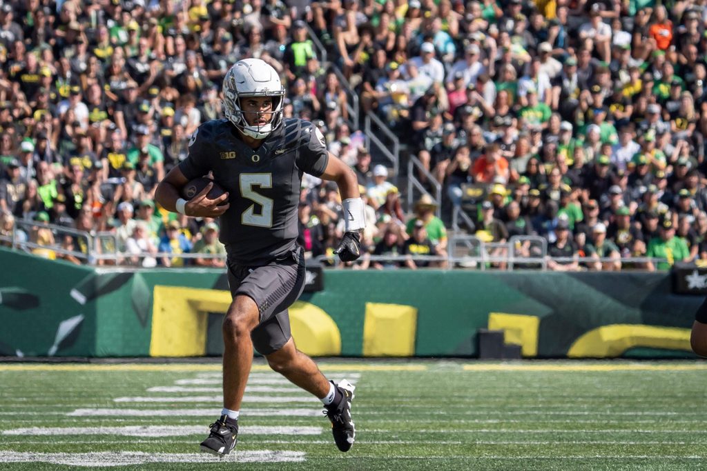 Oregon Ducks quarterback Dante Moore carries the ball as the Oregon Ducks host the Oregon State Beavers Sept. 20, 2025, at Autzen Stadium in Eugene, Oregon.