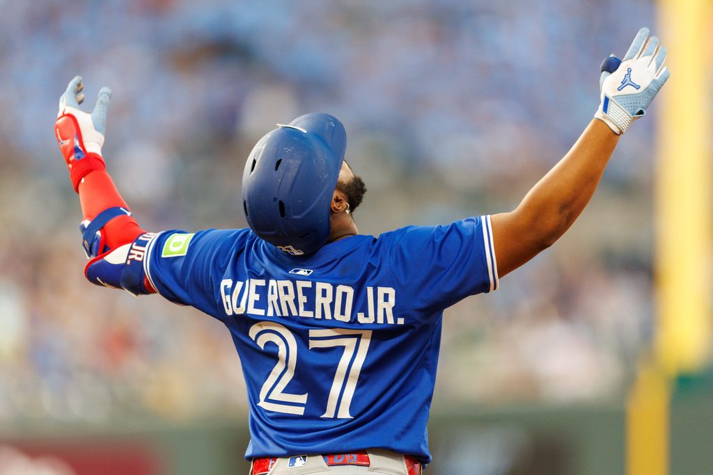 Sep 20, 2025; Kansas City, Missouri, USA; Toronto Blue Jays first base Vladimir Guerrero Jr. (27) reacts to a play during the fourth inning against the Kansas City Royals at Kauffman Stadium. Mandatory Credit: William Purnell-Imagn Images