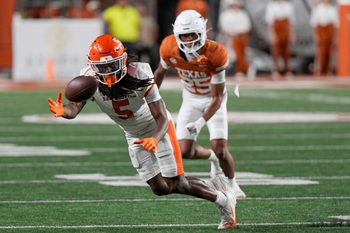 Sep 20, 2025; Austin, Texas, USA; Sam Houston Bearkats wide receiver Lonnie Adkism (5) reaches for a pass during the second half against the Texas Longhorns at Darrell K Royal-Texas Memorial Stadium. Mandatory Credit: Scott Wachter-Imagn Images