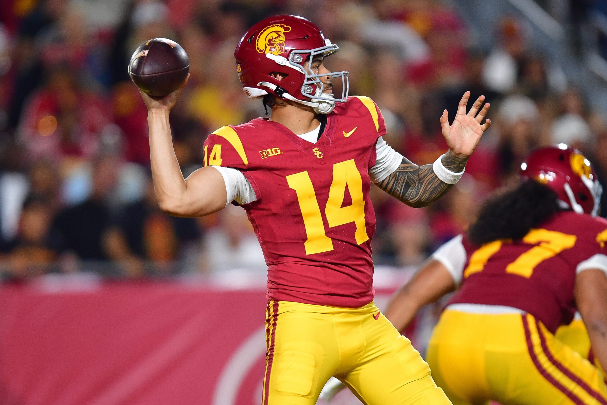 Sep 20, 2025; Los Angeles, California, USA; Southern California Trojans quarterback Jayden Maiava (14) throws against the Michigan State Spartans during the first half at the Los Angeles Memorial Coliseum. Mandatory Credit: Gary A. Vasquez-Imagn Images