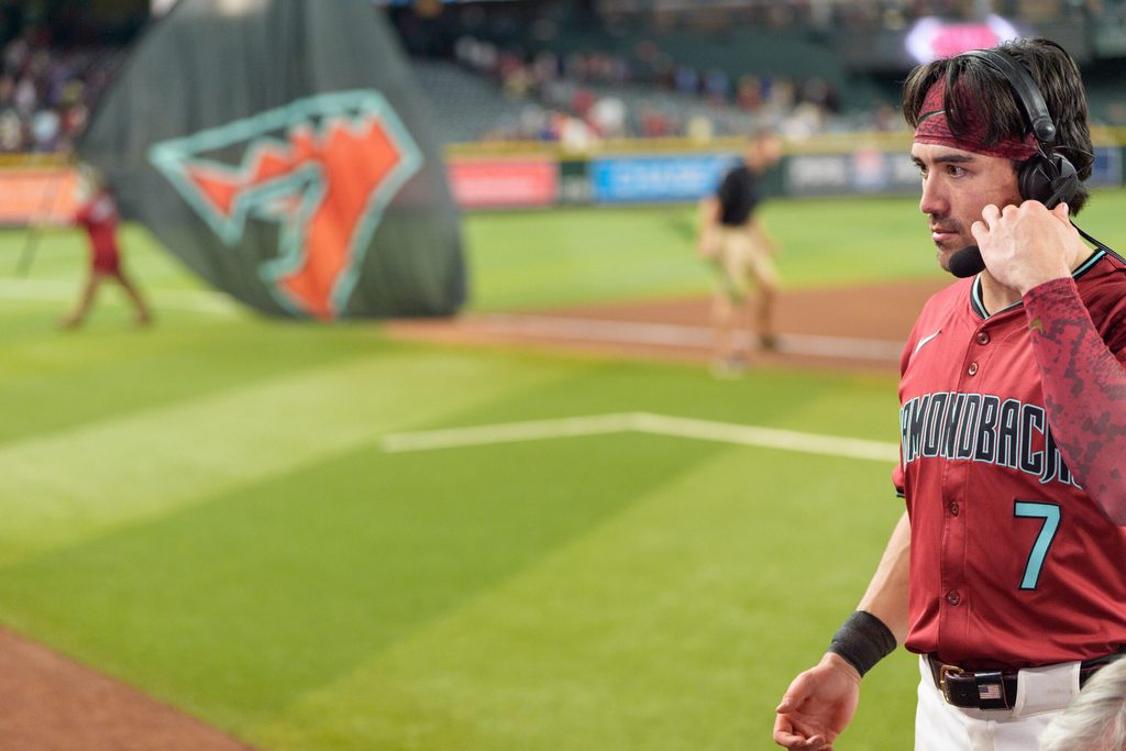 Sep 21, 2025; Phoenix, Arizona, USA; Arizona Diamondbacks outfielder Corbin Carroll (7) is interviewed after becoming the first Arizona Diamondbacks to join the 30-30 club after a game against the Philadelphia Phillies at Chase Field. Mandatory Credit: Allan Henry-Imagn Images