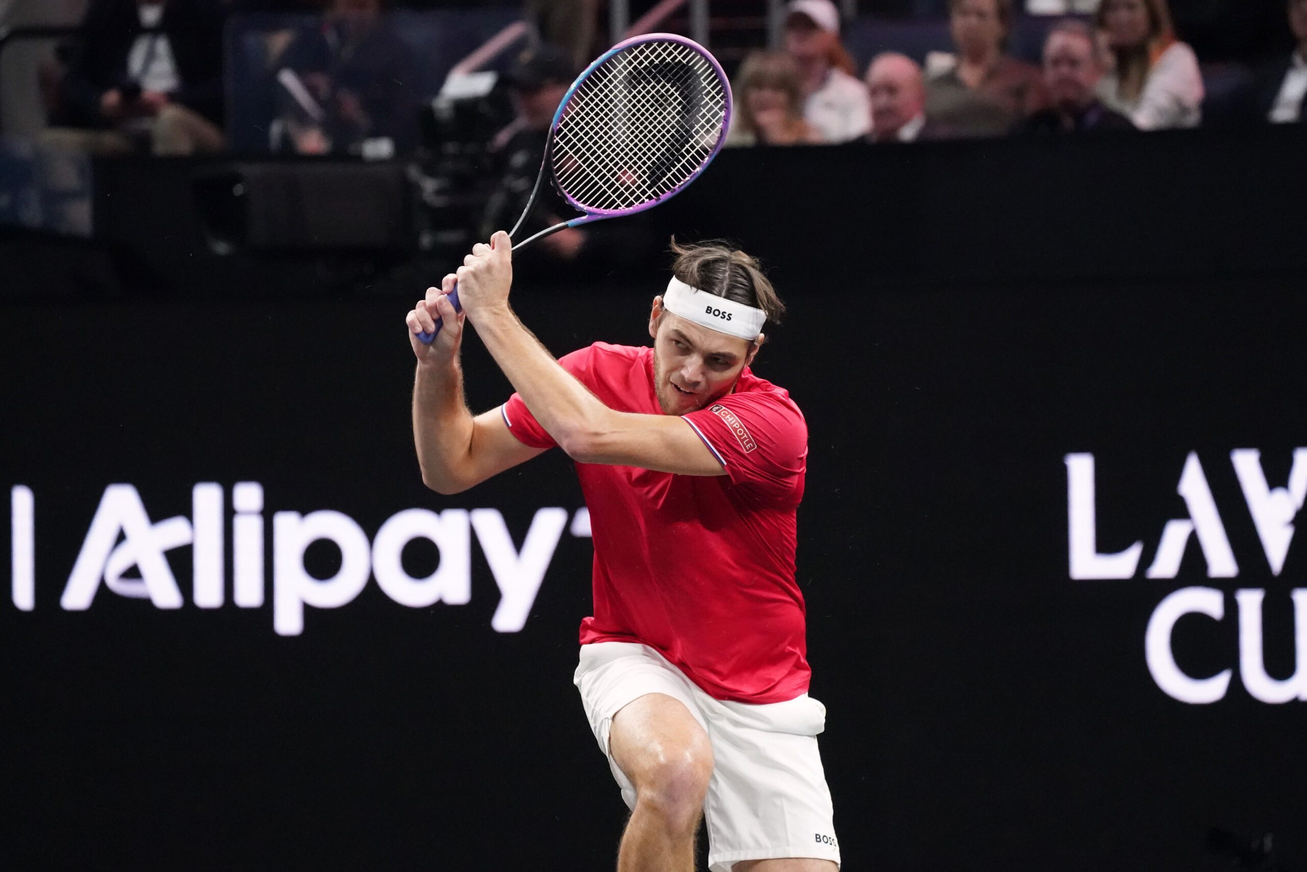 Sep 21, 2025; San Francisco, CA, USA; Team World player Taylor Fritz returns the ball from Team Europe player Alexander Zverev during the Laver Cup at Chase Center. Mandatory Credit: David Gonzales-Imagn Images