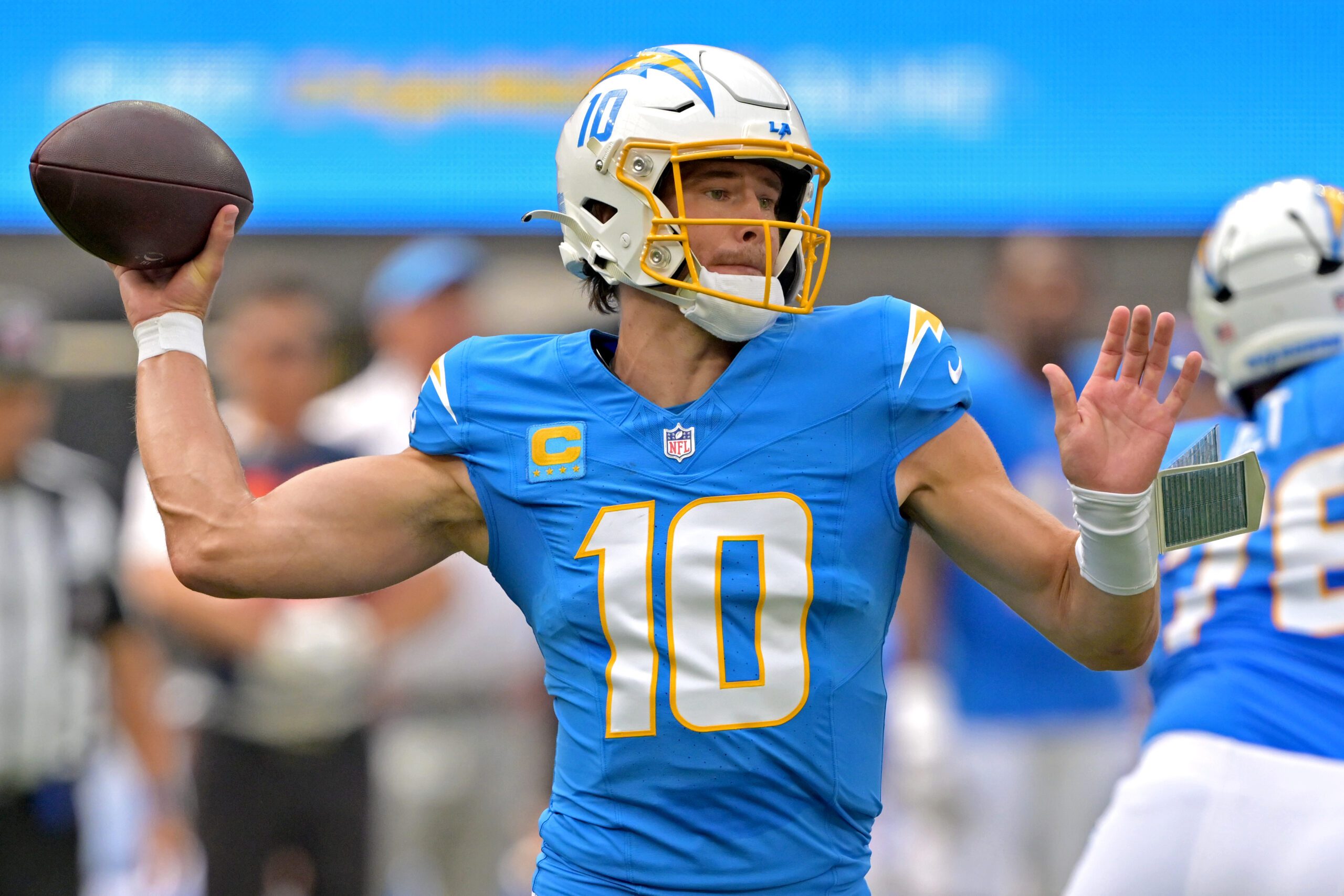 Sep 21, 2025; Inglewood, California, USA;  Los Angeles Chargers quarterback Justin Herbert (10) throws a pass in the first quarter against the Denver Broncos at SoFi Stadium. Mandatory Credit: Jayne Kamin-Oncea-Imagn Images