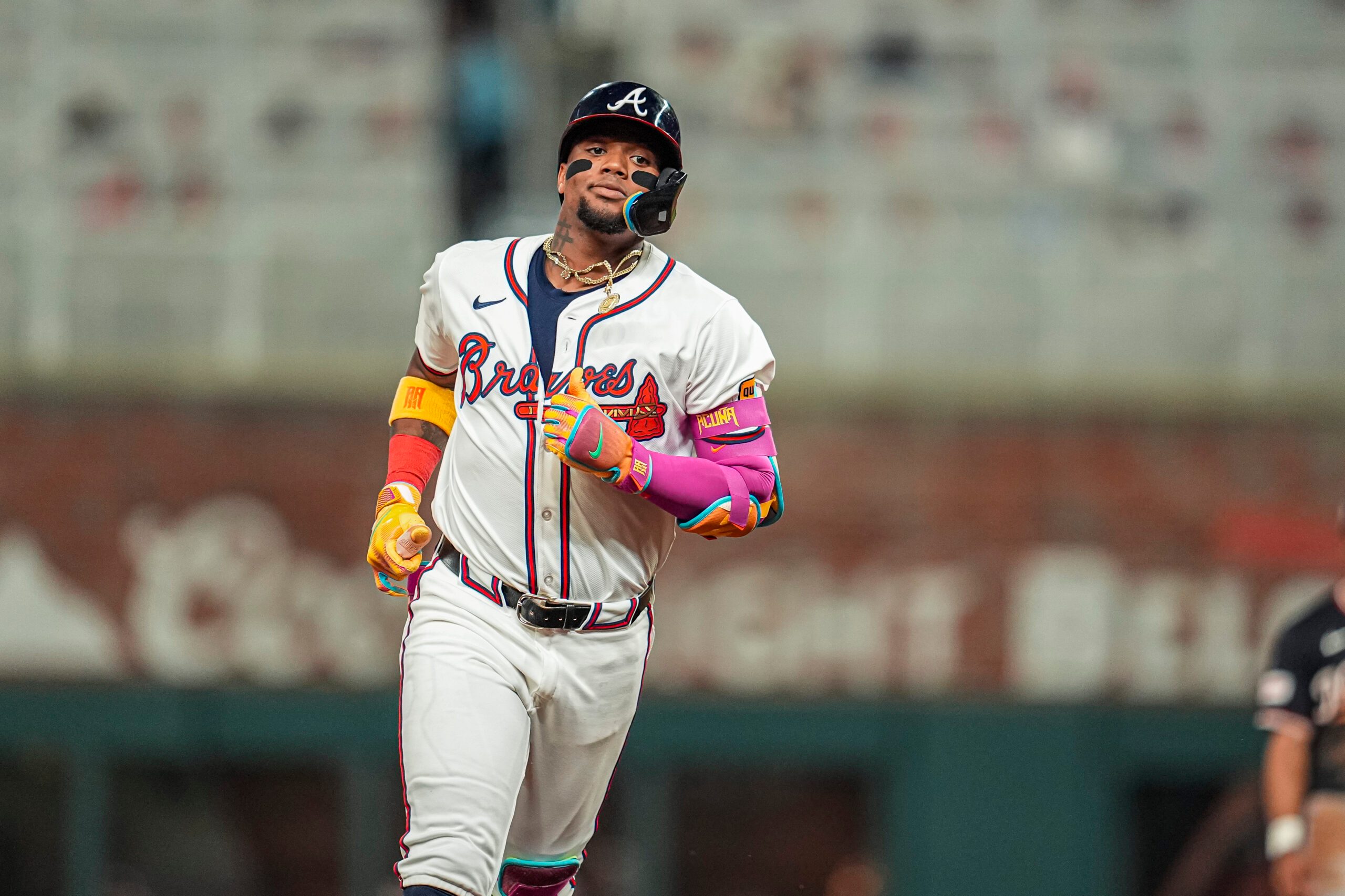 Sep 23, 2025; Cumberland, Georgia, USA; Atlanta Braves right fielder Ronald Acuna Jr (13) reacts after hitting a home run against the Washington Nationals during the sixth inning at Truist Park. Mandatory Credit: Dale Zanine-Imagn Images