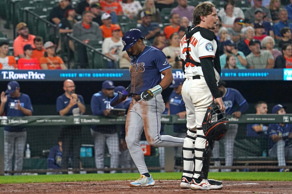 Sep 24, 2025; Baltimore, Maryland, USA; Tampa Bay Rays second baseman Richie Palacios (1) scores during the second inning on a hit by catcher Hunter Feduccia (not shown) against the Baltimore Orioles at Oriole Park at Camden Yards. Mandatory Credit: Mitch Stringer-Imagn Images
