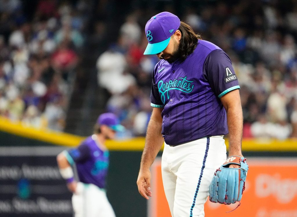 Arizona Diamondbacks pitcher Nabil Crismatt (61) reacts after giving-up back-to-back home runs to the Los Angeles Dodgers in the second inning during the season home finale at Chase Field in Phoenix on Sept. 25, 2025.