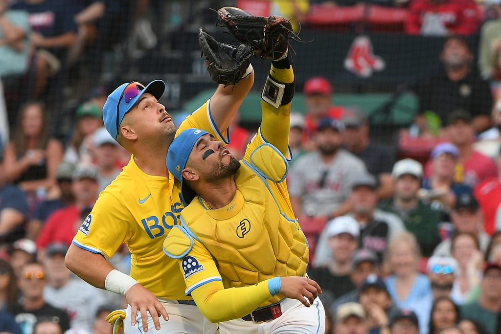 Sep 27, 2025; Boston, Massachusetts, USA; Boston Red Sox first baseman Nathaniel Lowe (37) and catcher Carlos Narvaez (75) track down a popup during the fifth inning against the Detroit Tigers at Fenway Park. Mandatory Credit: Bob DeChiara-Imagn Images