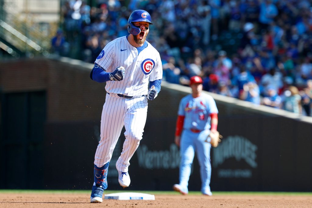Sep 27, 2025; Chicago, Illinois, USA; Chicago Cubs first baseman Michael Busch (29) rounds the bases after hitting a solo home run against the St. Louis Cardinals during the first inning at Wrigley Field. Mandatory Credit: Kamil Krzaczynski-Imagn Images