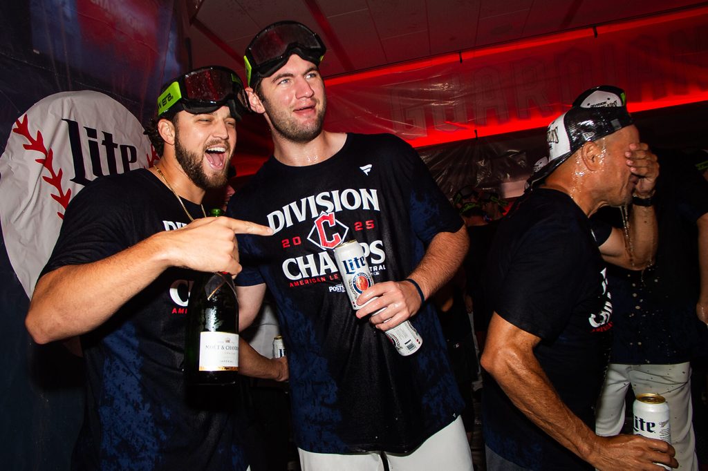 Sep 28, 2025; Cleveland, Ohio, USA; Cleveland Guardians starting pitcher Slade Cecconi (44) and starting pitcher Gavin Williams, middle, celebrate after the Guardians won the American League Central Division at Progressive Field. Mandatory Credit: Ken Blaze-Imagn Images