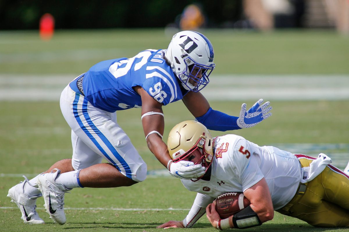Sep 19, 2020; Durham, North Carolina, USA; Duke Blue Devils linebacker Chris Rumph II (96) tackles Boston College Eagles quarterback Phil Jurkovec (5) at Wallace Wade Stadium. Mandatory Credit: Nell Redmond-Imagn Images