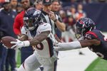 Dec 3, 2023; Houston, Texas, USA;Denver Broncos wide receiver Jerry Jeudy (10) catches the ball against Houston Texans cornerback Desmond King II (25) in the second half at NRG Stadium. Mandatory Credit: Thomas Shea-Imagn Images