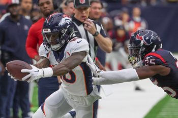 Dec 3, 2023; Houston, Texas, USA;Denver Broncos wide receiver Jerry Jeudy (10) catches the ball against Houston Texans cornerback Desmond King II (25) in the second half at NRG Stadium. Mandatory Credit: Thomas Shea-Imagn Images