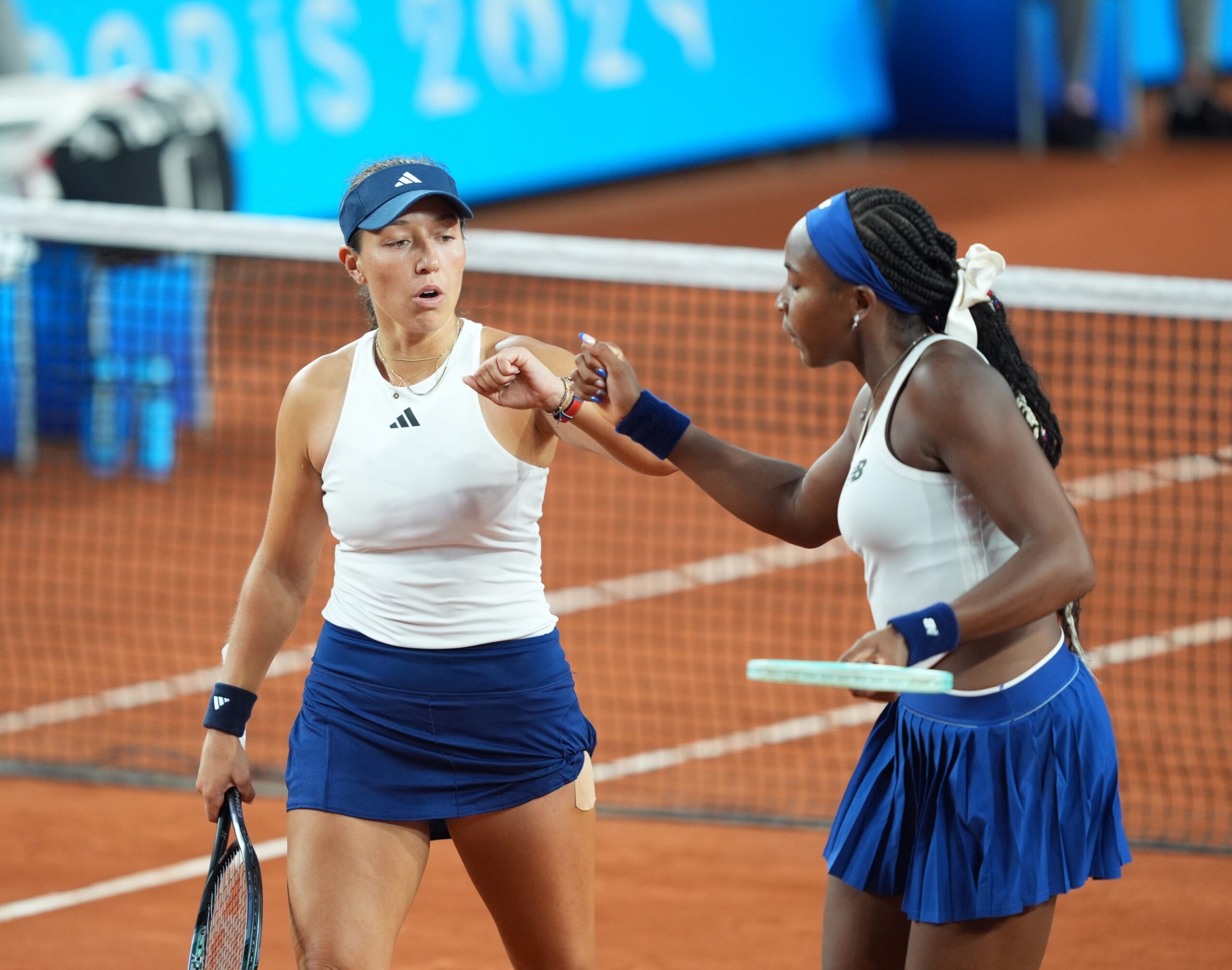 Jul 27, 2024; Paris, France; Coco Gauff (USA) and Jessica Pegula (USA) defeats Ellen Perez and Daria Saville (AUS) during a women's tennis doubles match during the Paris 2024 Olympic Summer Games at Stade Roland Garros. Mandatory Credit: Amber Searls-Imagn Images