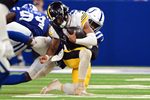 Sep 29, 2024; Indianapolis, Indiana, USA; Indianapolis Colts defensive end Tyquan Lewis (94) and linebacker E.J. Speed (45) sack Pittsburgh Steelers quarterback Justin Fields (2) during the second half at Lucas Oil Stadium. Mandatory Credit: Marc Lebryk-Imagn Images