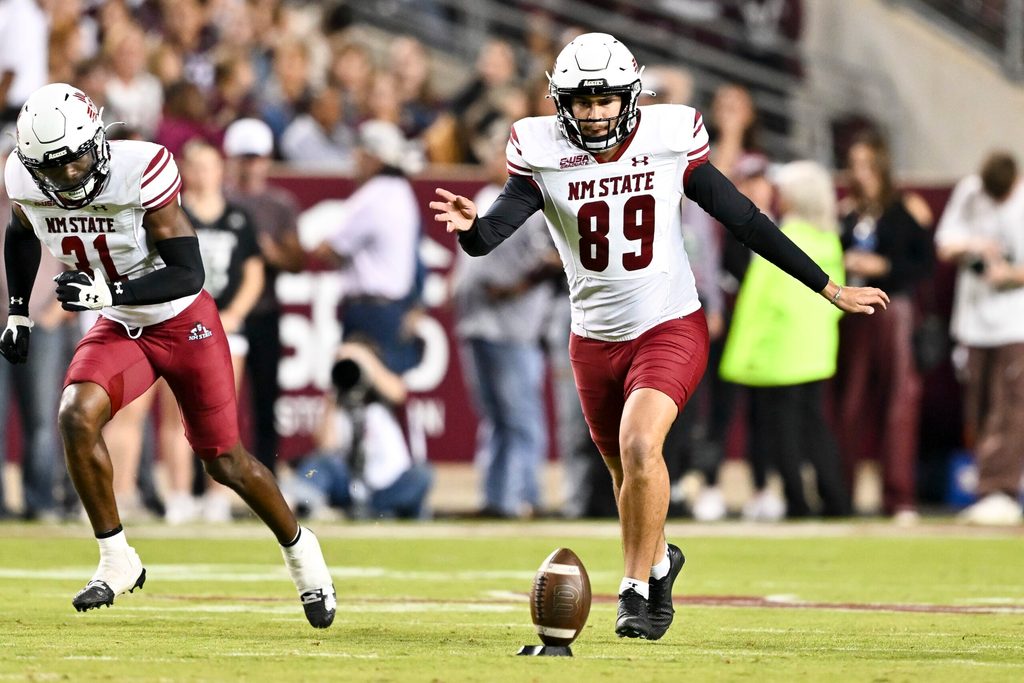 Nov 16, 2024; College Station, Texas, USA; New Mexico State Aggies place kicker Abraham Montano (89) kicks the ball during the second half against the Texas A&M Aggies at Kyle Field. Mandatory Credit: Maria Lysaker-Imagn Images